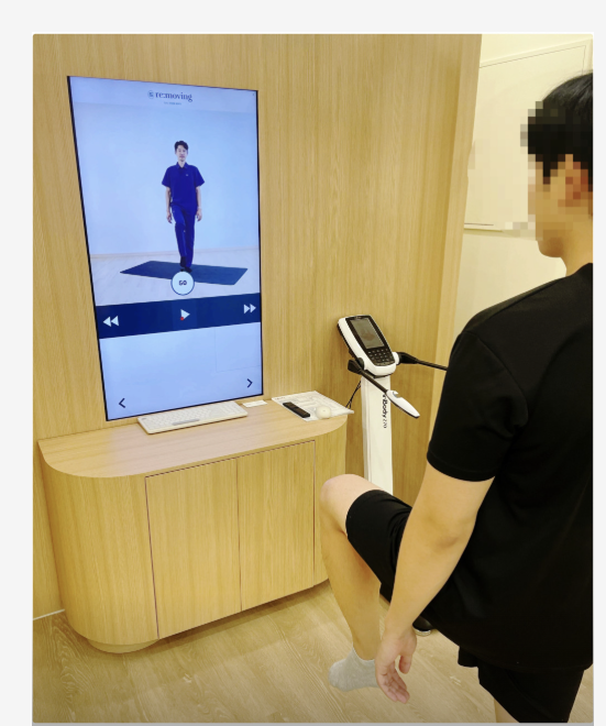 Motionary kiosk in real-world use: portrait display with InBody scale